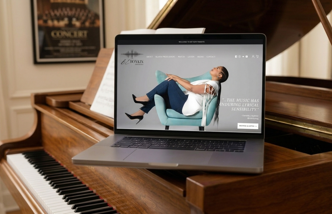 Custom website for musician and composer B.E. Boykin displayed on a laptop, featuring her compositions, performances, musical portfolio, and professional biography.